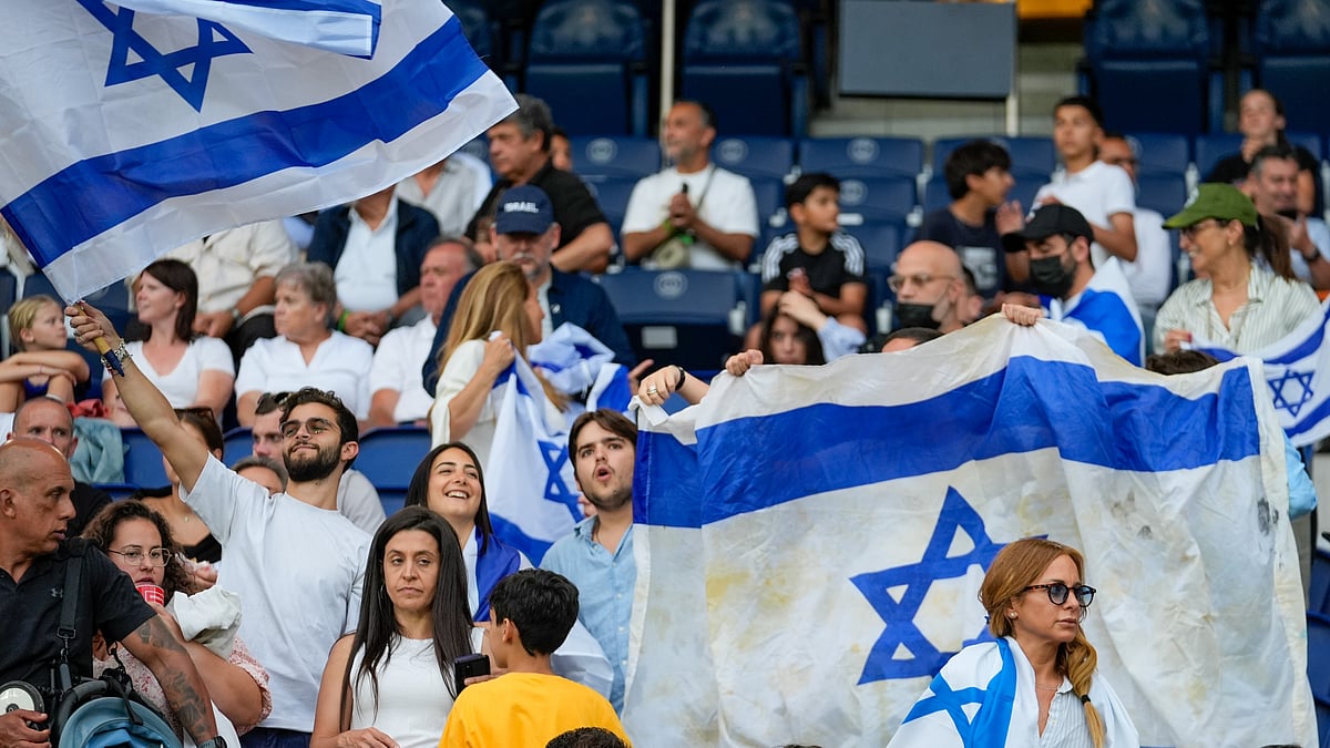 (AP Photo/Rebecca Blackwell) : Israel supporters react during the men's group D match between Israel and Mali at the Parc des Princes during the 2024 Summer Olympics, Wednesday, July 24, 2024, in Paris, France. 